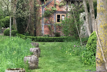 thatched house garden